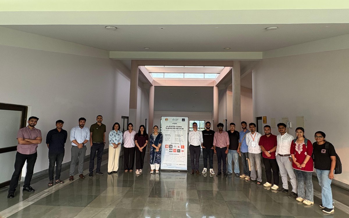 The full training cohort at IIT Guwahati with the programme banner